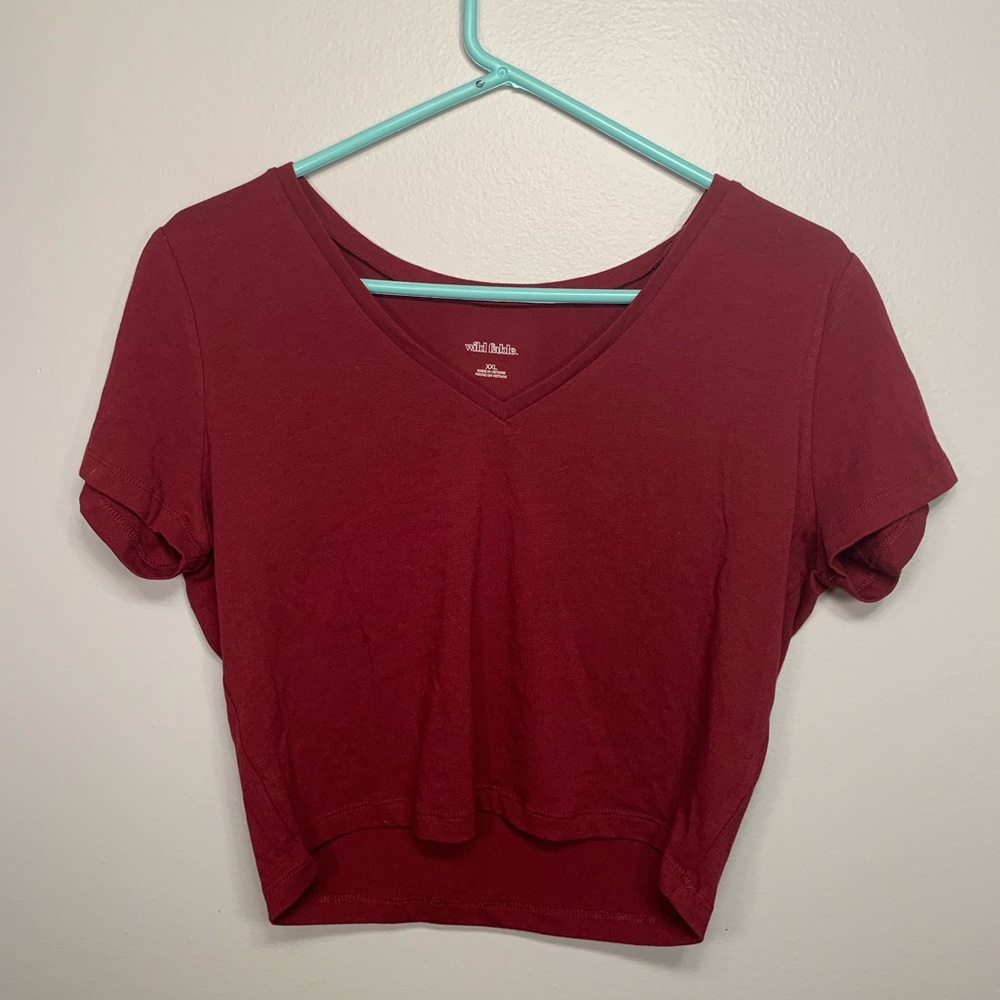 Red target crop top with V neck.